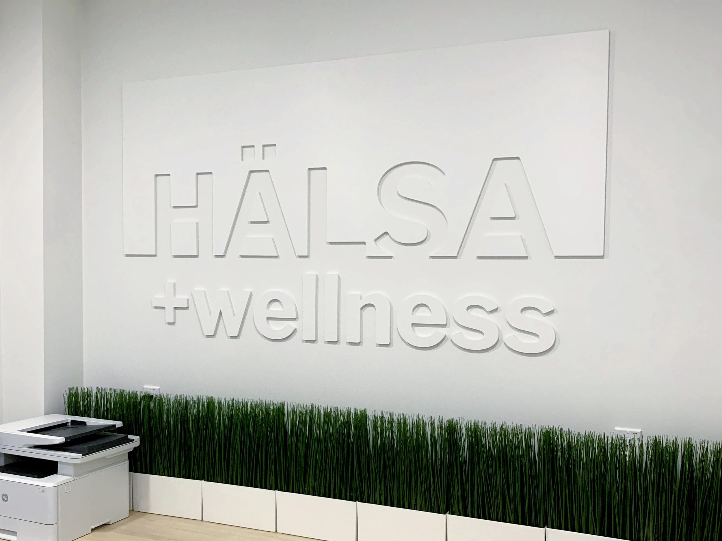 Hälsa + Wellness Lobby Signage by McBain Signs, Custom Signage and Vehicle Wraps Ontario